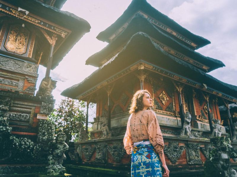 Woman walking in Balinese temple