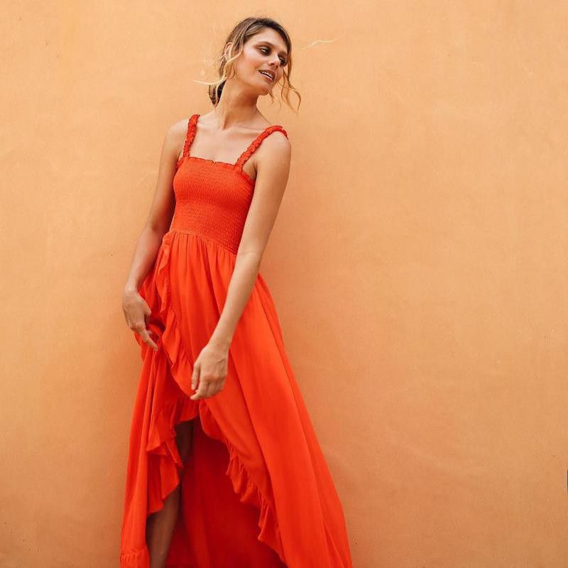 Woman wearing tangerine dress