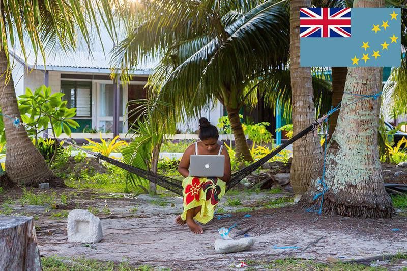 Woman working on hammock in Tuvalu