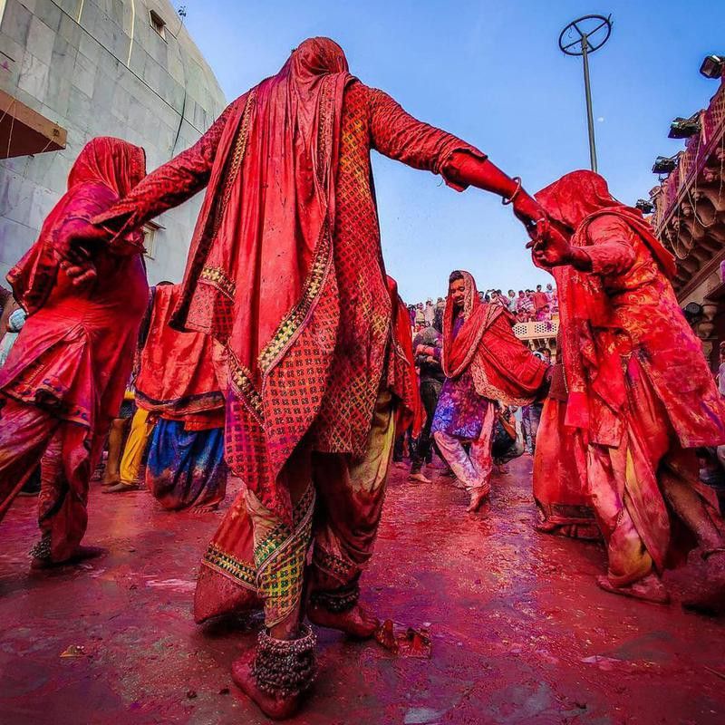 Women dancing during Holi