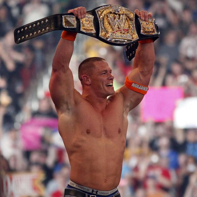 WWE Superstar John Cena celebrates winning WWE championship in 2010