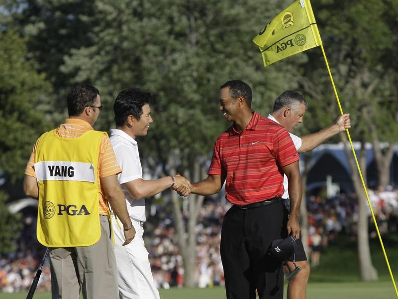 Y.E. Yang and Tiger Woods