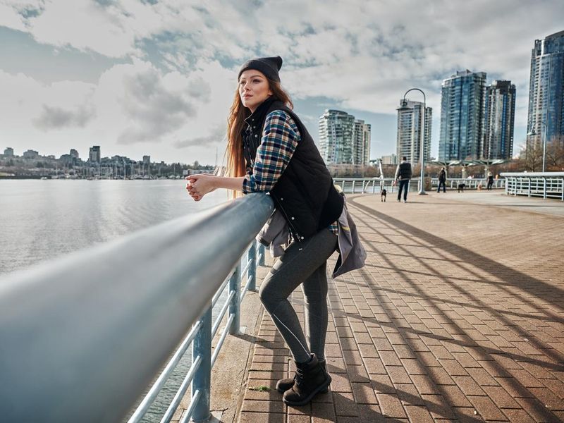Young woman enjoying Vancouver during the autumn